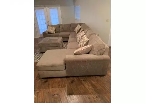 Four piece sectional couch w/ ottoman